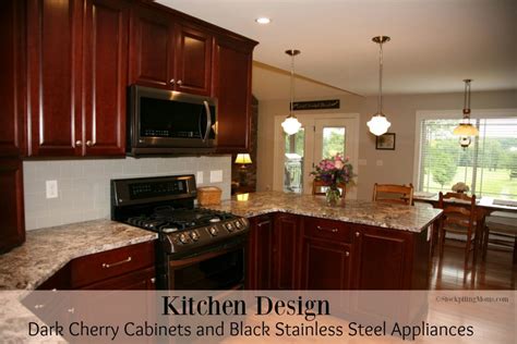 black stainless steel kitchen appliances cherry cabineta|black stainless steel cabinet color schemes.